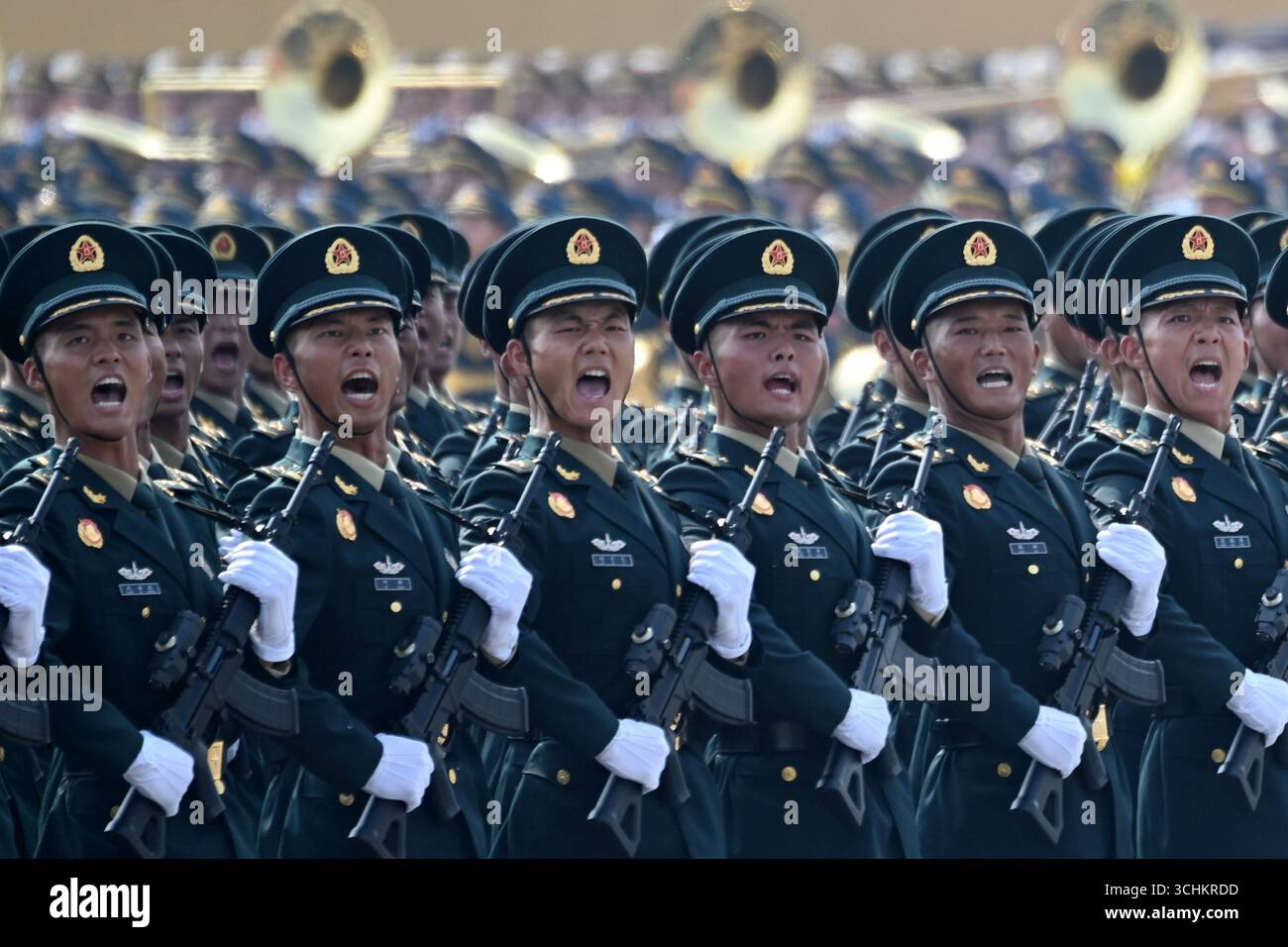 03 September 2025, China, Peking: Soldiers walk past Tiananmen Square ...