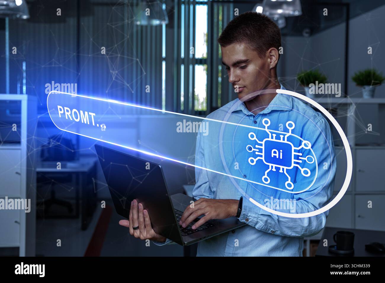 Young man using a laptop in a modern office while interacting with artificial intelligence technology display Stock Photo