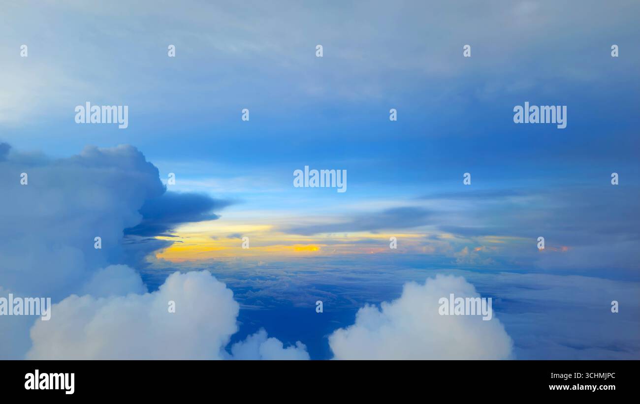 Scenic view of blue sky and fluffy clouds at high altitude, peaceful natural atmosphere above horizon - Smartphone Captured Stock Image