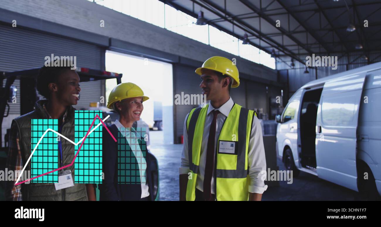 Discussing loading tasks warehouse workers wearing helmets and vests in loading bay, with forklift Stock Photo