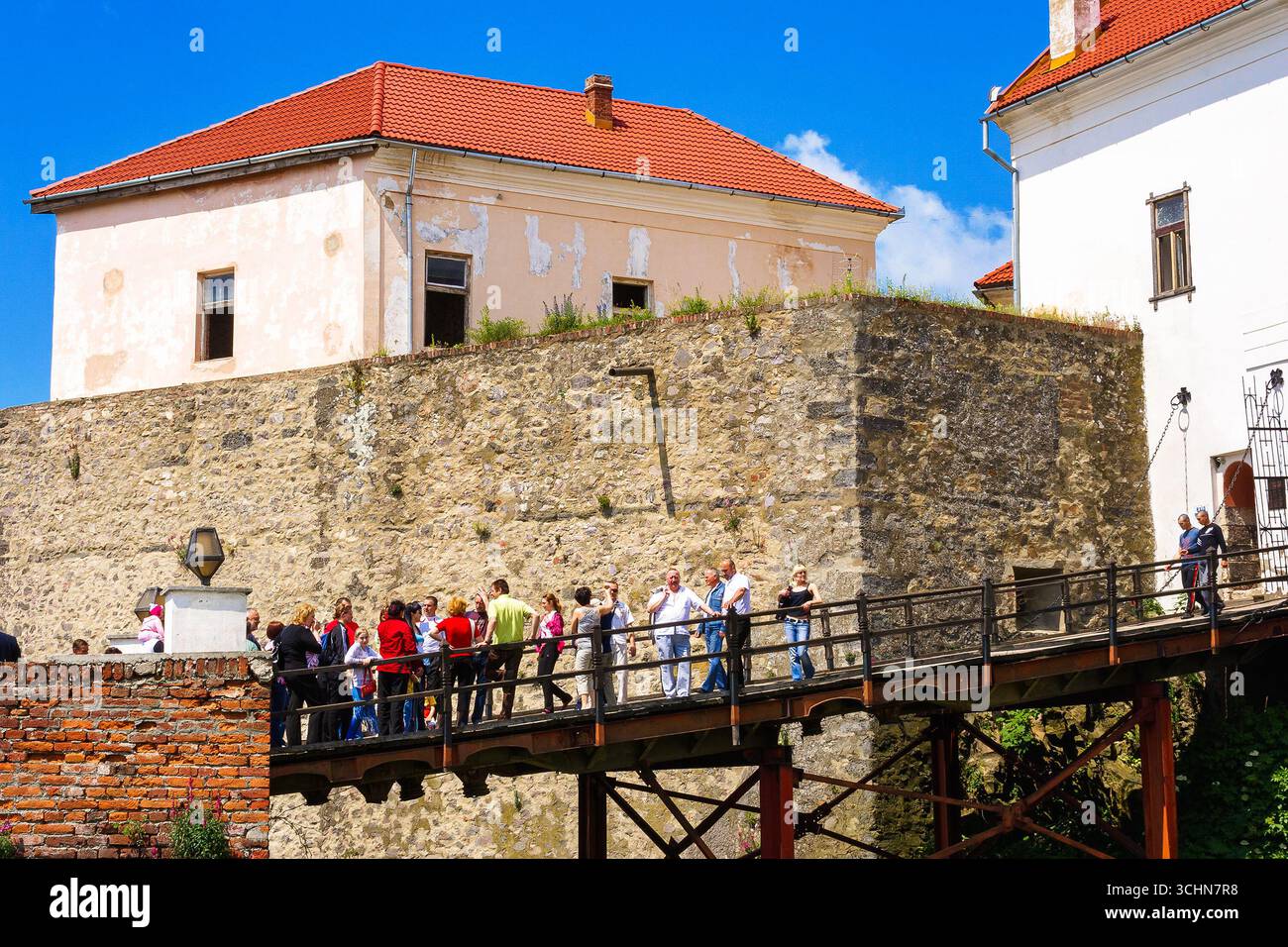 mukachevo, ukraine - may 25, 2008: palanok castle in summertime. old fortification now serves as the museum and is popular tourist landmark of transca Stock Photo