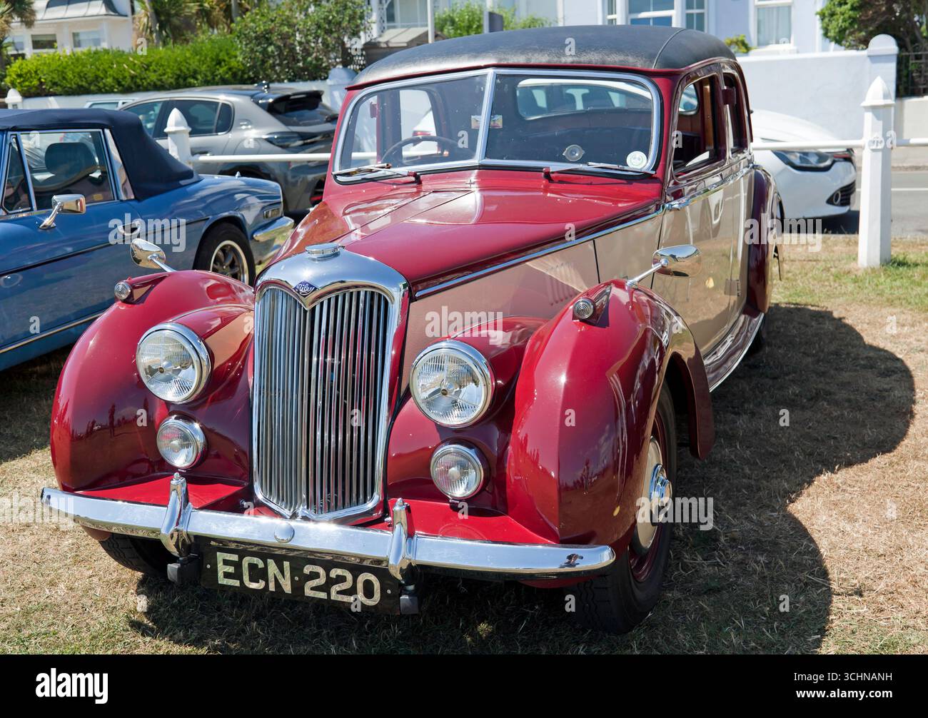 Three-quarter Front View of a Maroon, 1954, Riley RME, on display at ...