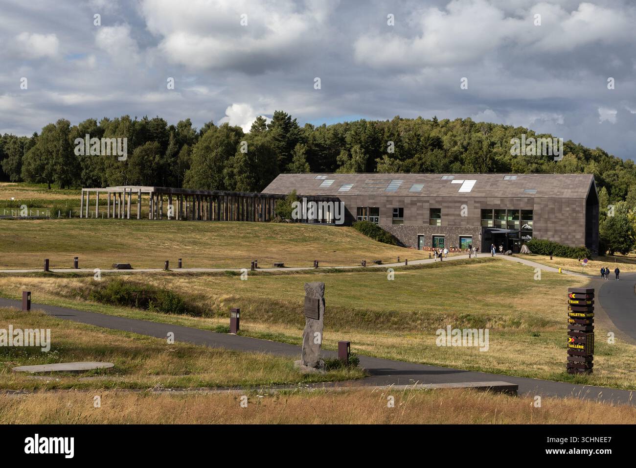 CLERMONT-FERRAND, FRANCE, 24 JULY 2025: The bottom train station and visitors center of the scenic railway of Puy de Dome volcano. The electric rack r - Stock Image