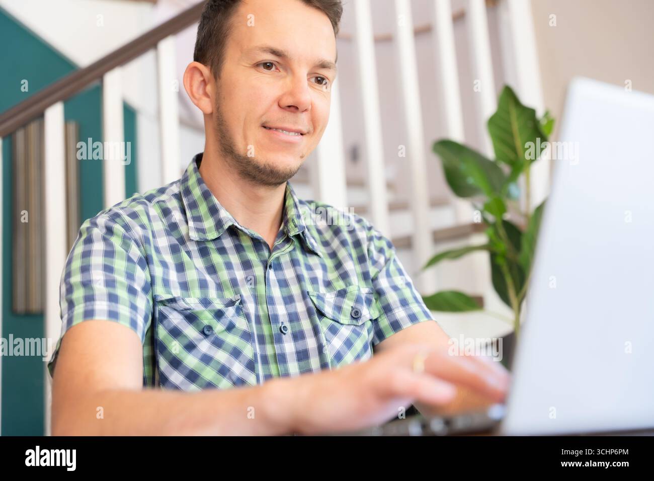 Smiling Man Using Laptop At Home Office Positive Remote Work Concept Stock Photo