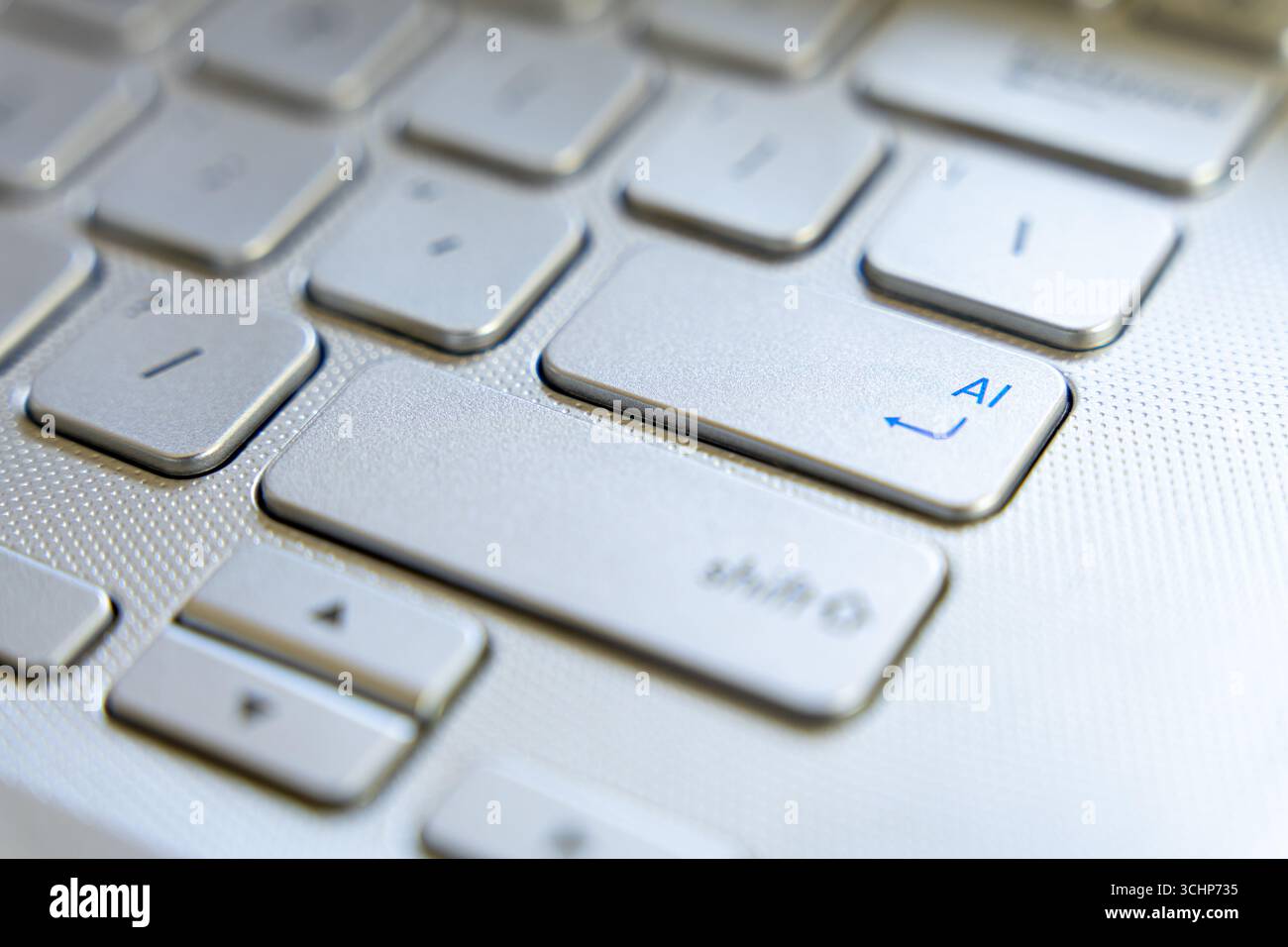 Close Up Of Computer Keyboard With AI Key Symbolizing Artificial Intelligence Stock Photo