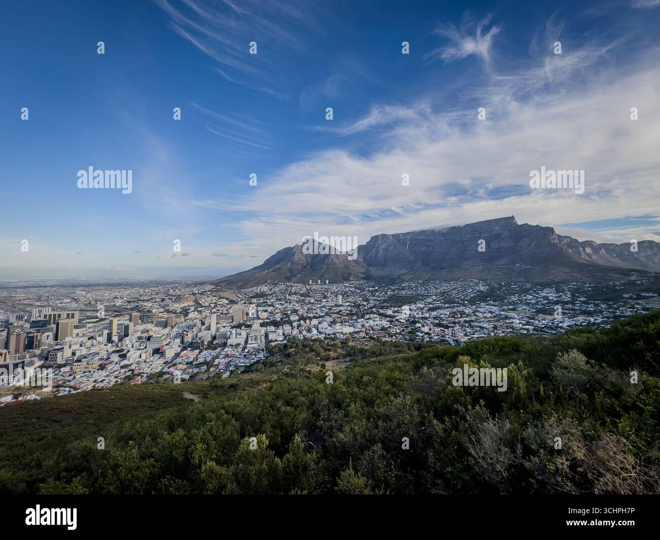 A panoramic view of Cape Town, South Africa, with its sprawling cityscape at the foot of the iconic Table Mountain. - Smartphone Captured Stock Image