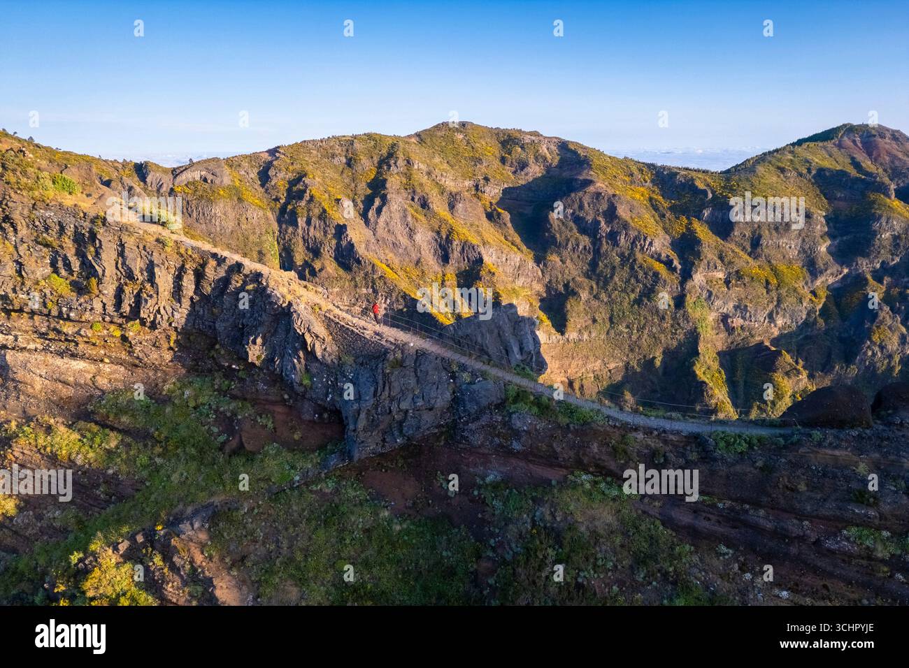 Aerial view of the mountains and trails leading to Pico Pico do Arieiro during a spring sunset. Madeira island, Portugal. Stock Photo