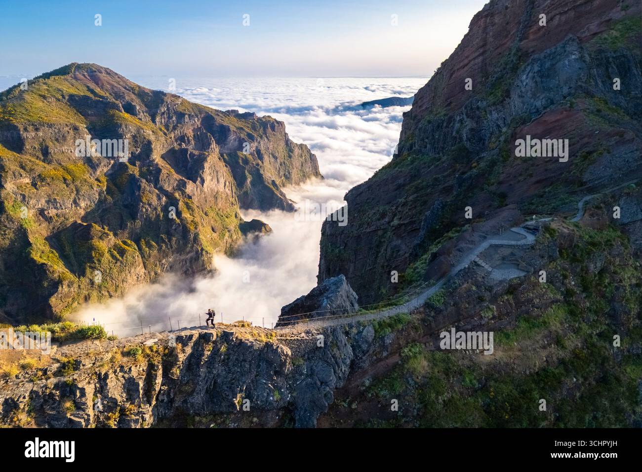 Aerial view of the mountains and trails leading to Pico Pico do Arieiro during a spring sunset. Madeira island, Portugal. Stock Photo