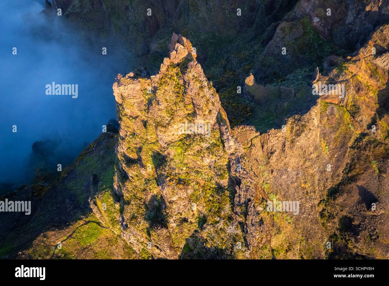 Aerial view of the mountains and trails leading to Pico Pico do Arieiro during a spring sunset. Madeira island, Portugal. Stock Photo