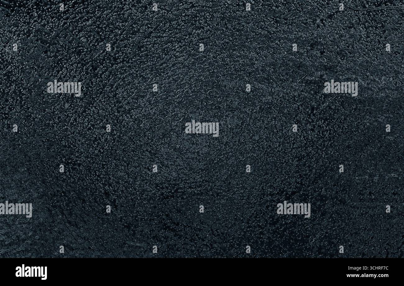 Dark and textured background providing a dramatic and atmospheric backdrop Stock Photo
