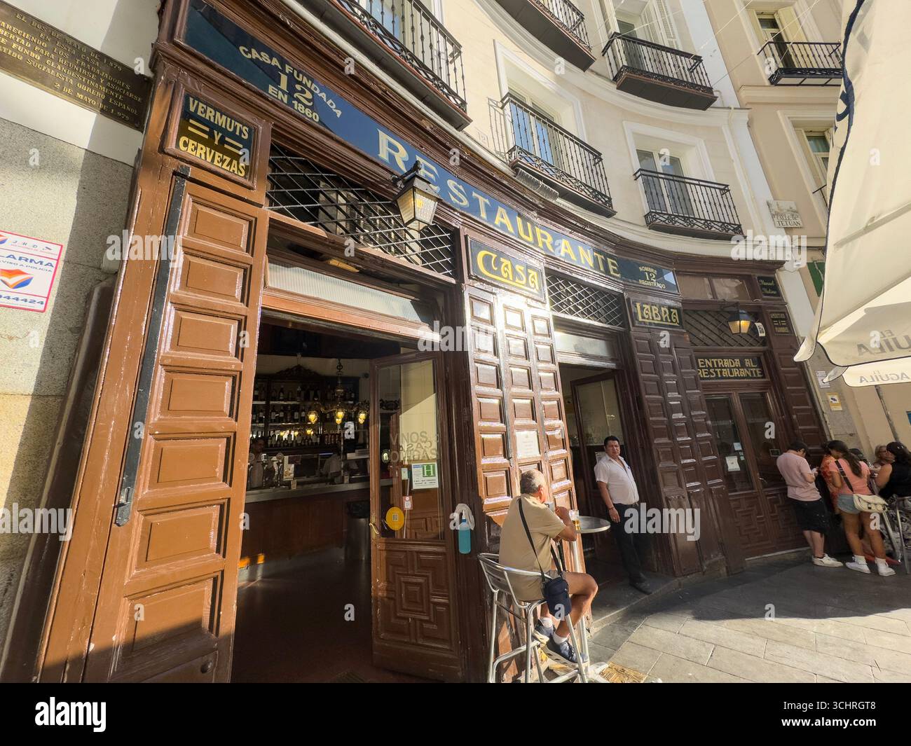 Established in 1860, Casa Labra is a historic tavern located at Calle de Tetuán, 12, just steps from Puerta del Sol in central Madrid, Spain - Smartphone Captured Stock Image