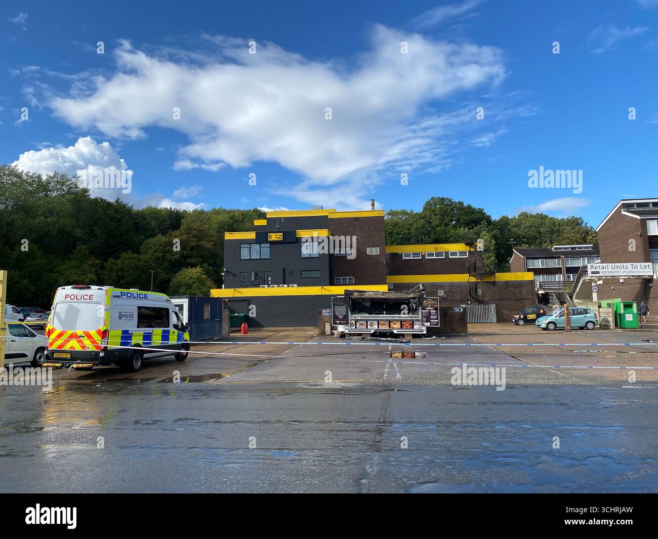 A mobile kebab van has been destroyed by fire and police are on scene and investigating - Smartphone Captured Stock Image