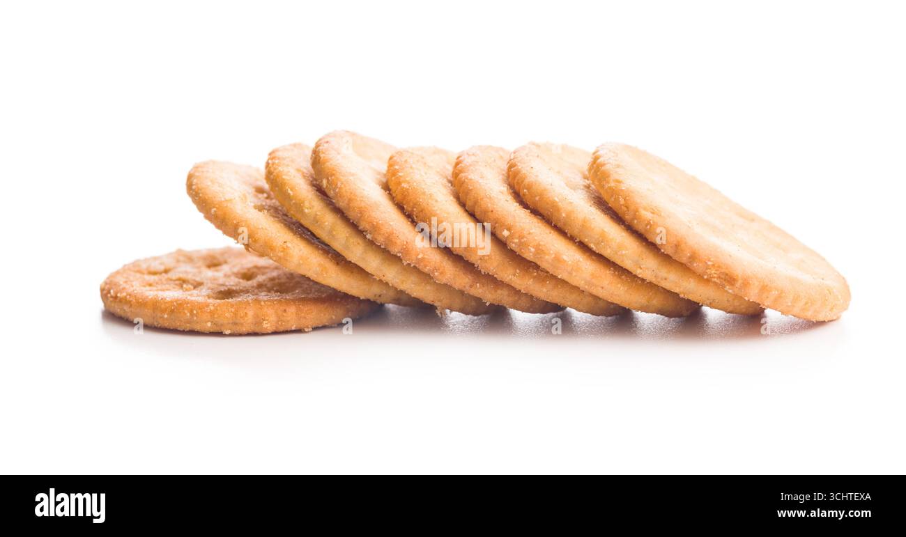 Crispy round salted crackers isolated on a white background. Stock Photo