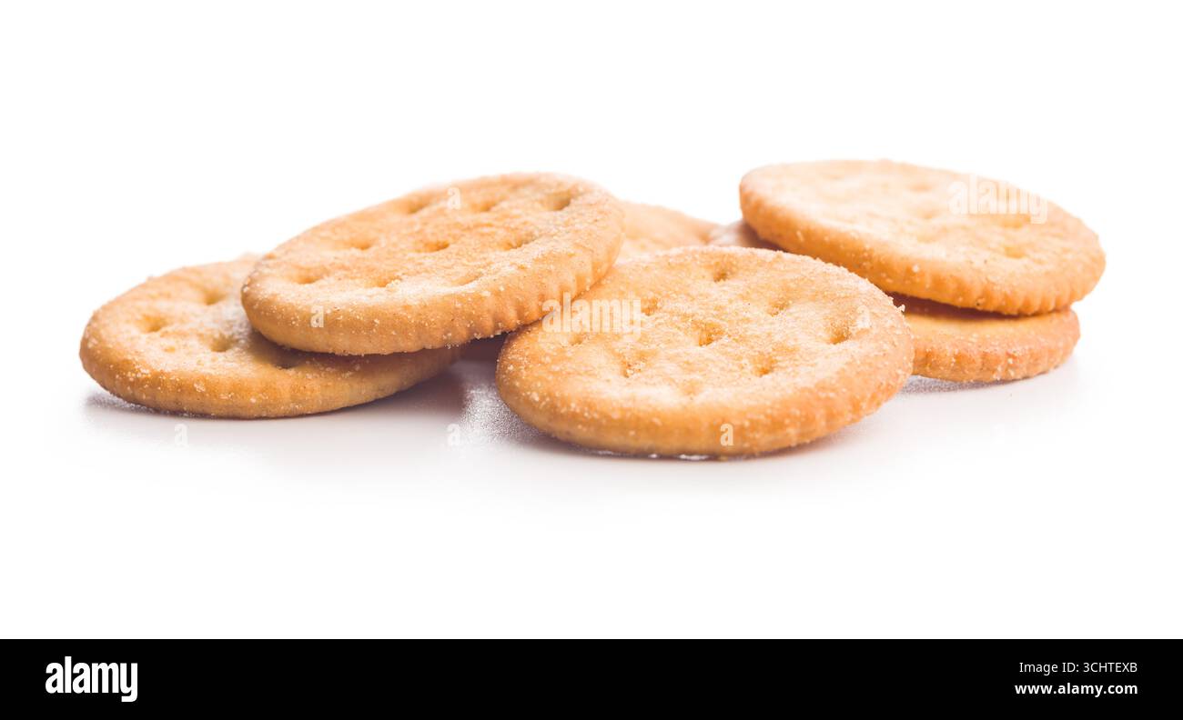 Crispy round salted crackers isolated on a white background. Stock Photo