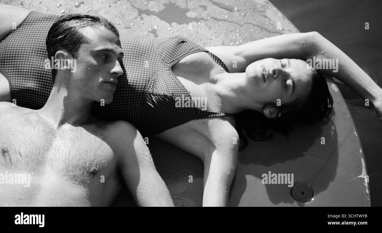 L'étranger (2025) directed by François Ozon and starring Rebecca Marder and Benjamin Voisin. In 1930s Algeria, apathetic Frenchman Meursault shows total indifference to life. His emotional detachment leads to a murder, followed by a trial that scrutinizes both the crime and his character. Publicity still EDITORIAL USE ONLY. Credit: BFA / Gaumont Stock Photo