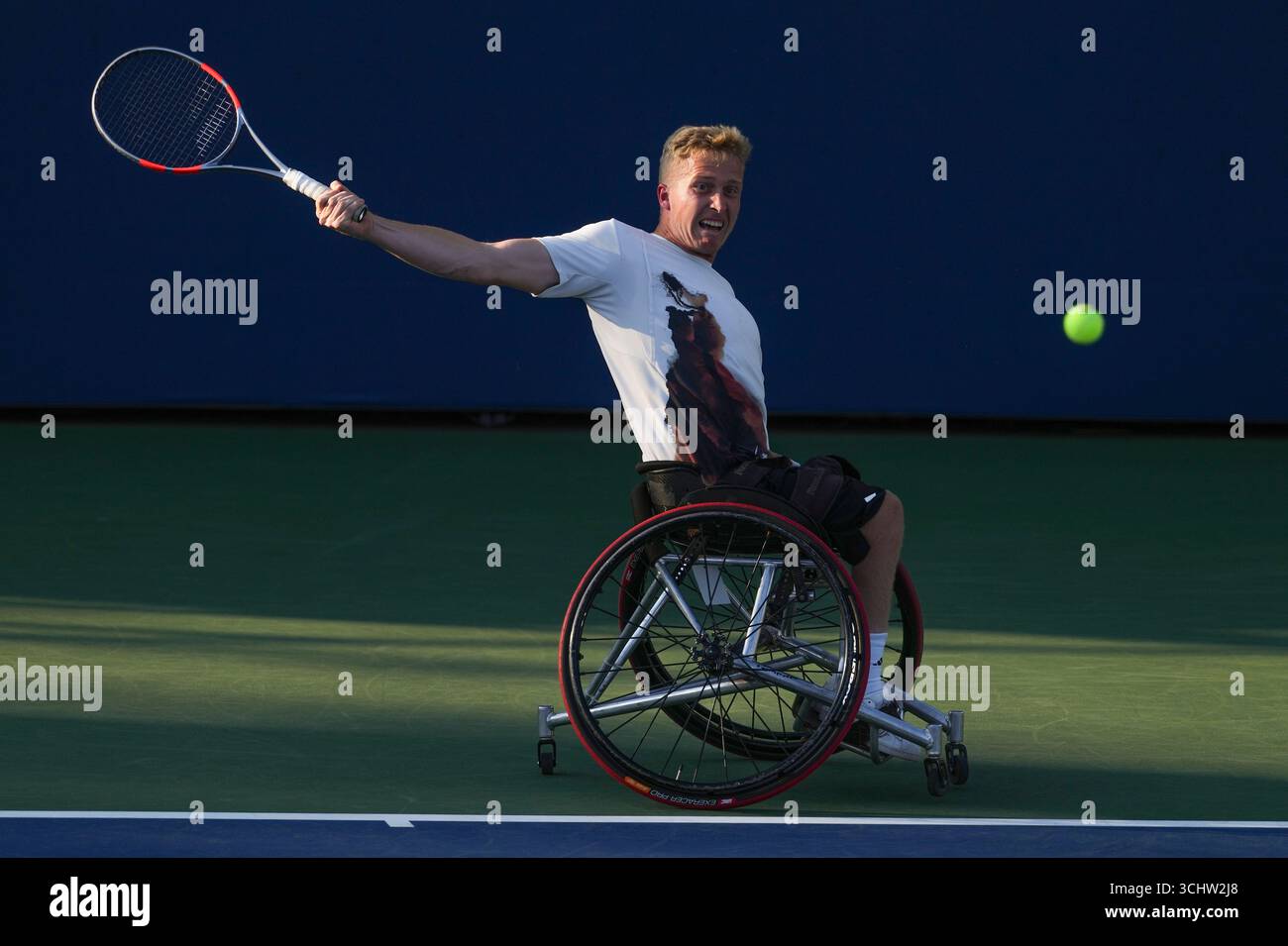 Kevin Ratzlaff Casey Ratzlaff, of the United States, returns a shot to Tokito Oda, of ...