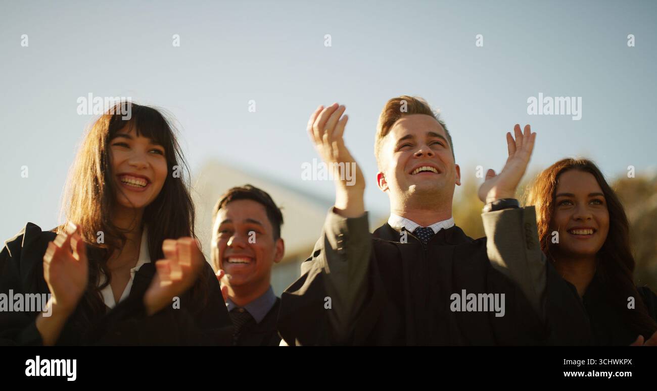 Excited clapping graduation group hi-res stock photography and images ...