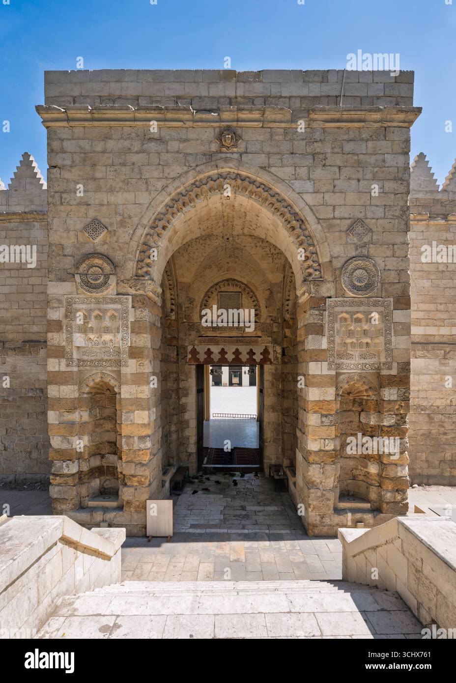 Al-Zahir Baybars Mosque, Cairo, Egypt. Ornate stone entrance with a ...