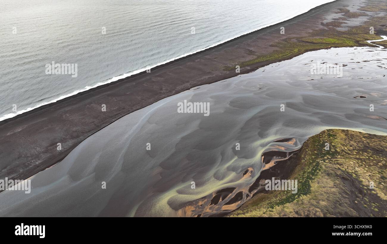 View stark black sands hi-res stock photography and images - Alamy