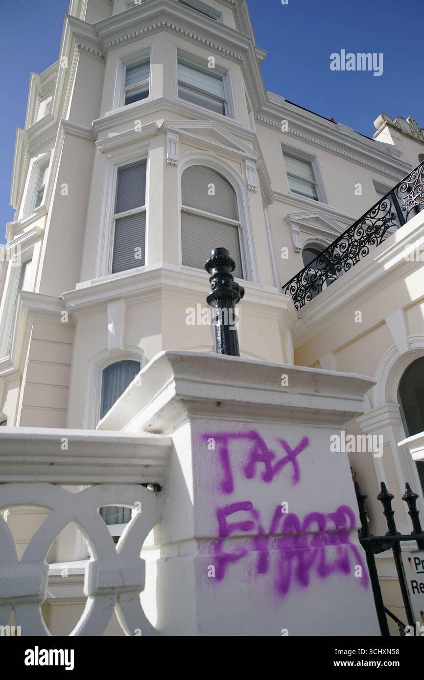 Rayner Graffit Graffiti daubed outside the apartment building in Hove, East Sussex ...