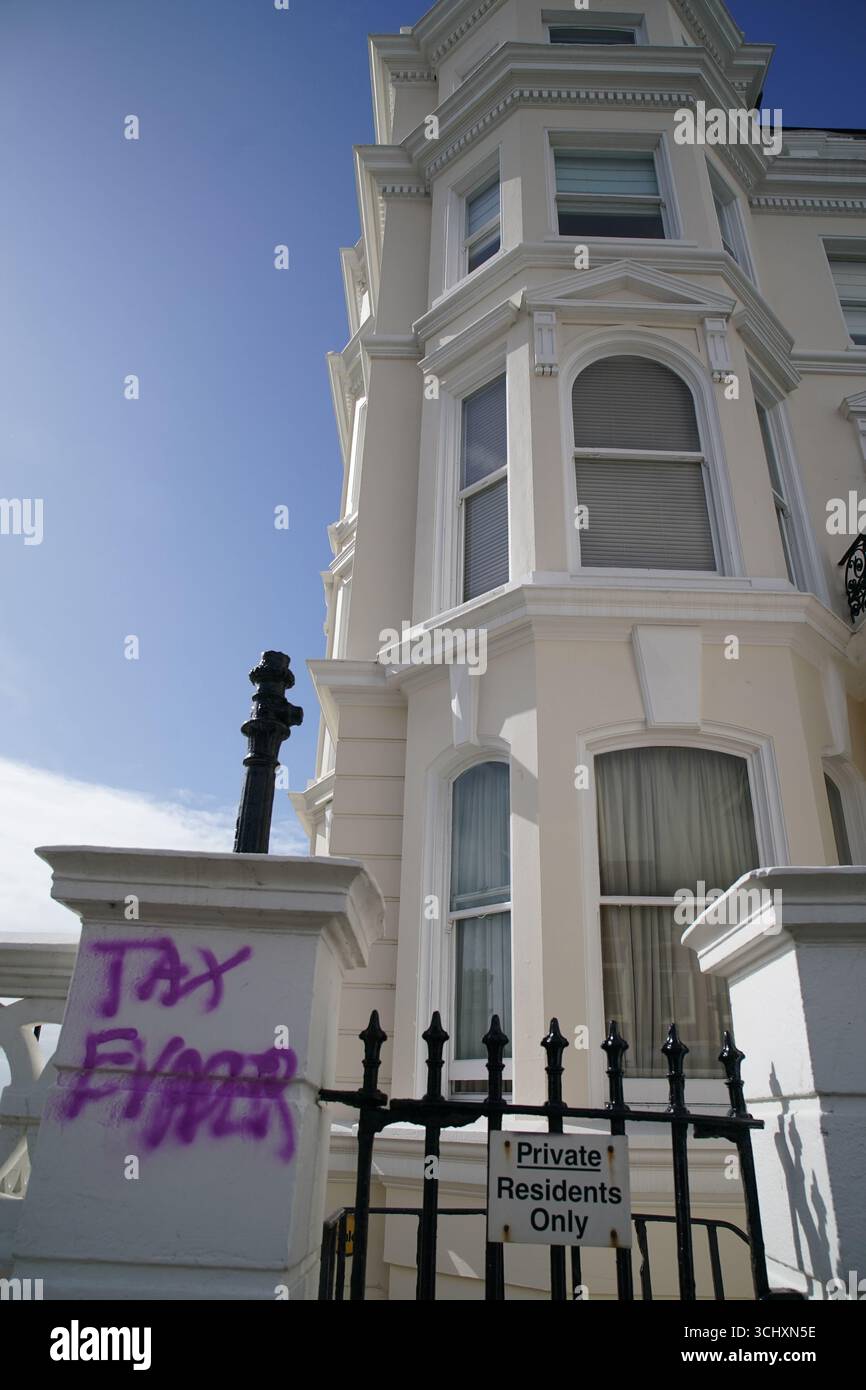 Rayner Graffit Graffiti daubed outside the apartment building in Hove, East Sussex ...