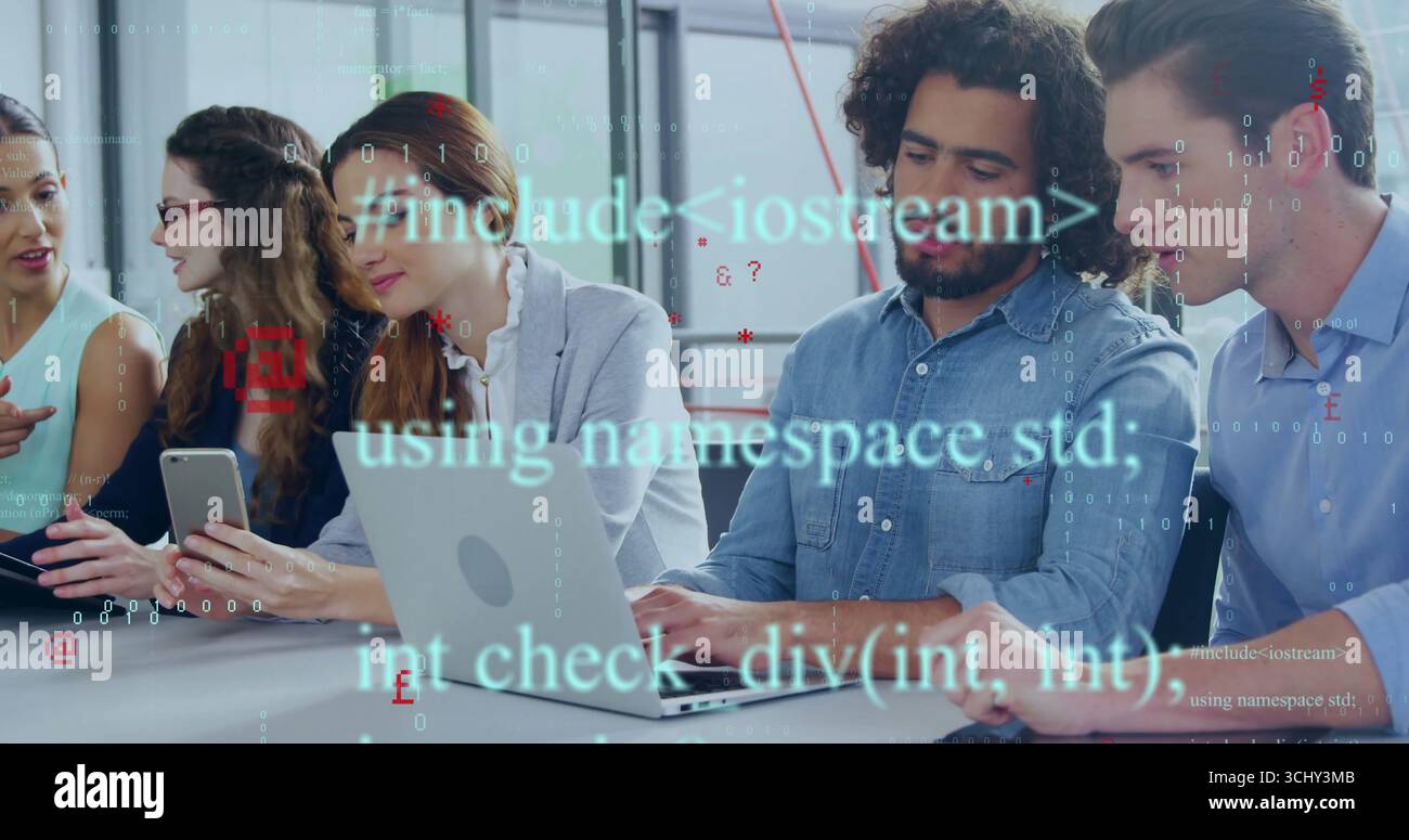Collaborating five professionals reviewing code on laptops and smartphone at office meeting table Stock Photo