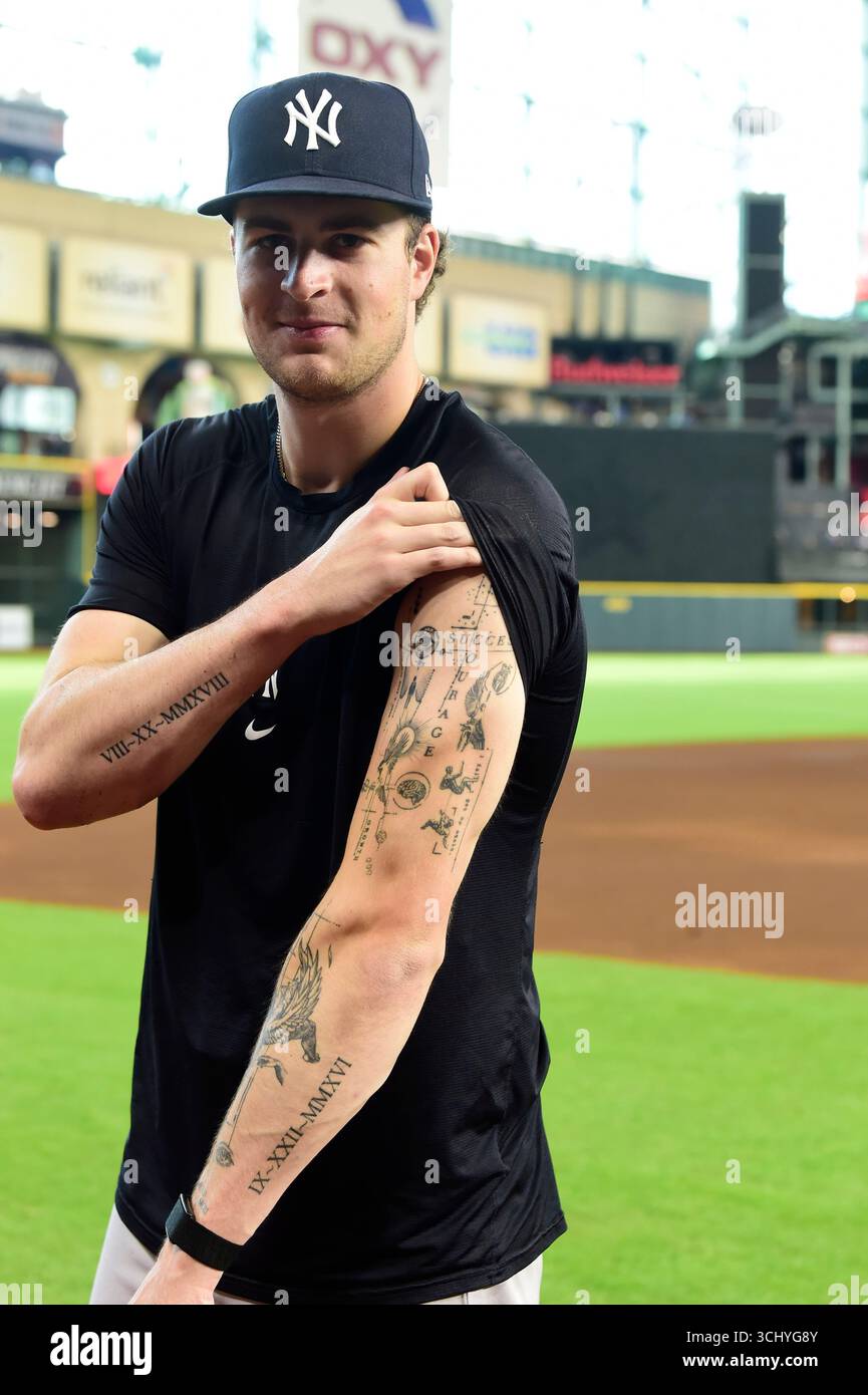 Houston, TX USA; New York Yankees pitcher Cam Schlittler (31) shows off his arm  tattoos during an MLB game against the Houston Astros on Tuesday September  2, 2025 at Daikin Park. The, image size:865x1390