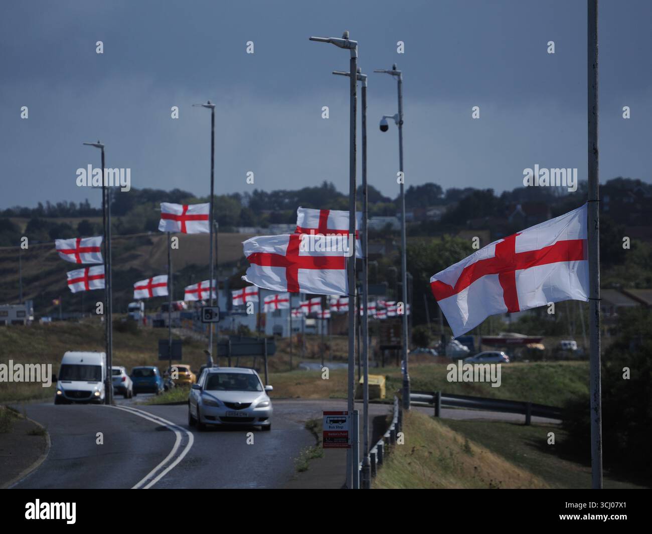 Sheerness, Kent, UK. 4th Sep, 2025. St George's flags strewn from lamp posts along the coast road in Sheerness, Kent. Across the country Brits have been putting up the flags due to an online campaign called 'Operation raise the colours'. Yvette Cooper has encouraged the public to fly the flags. Credit: James Bell/Alamy Live News Stock Photo