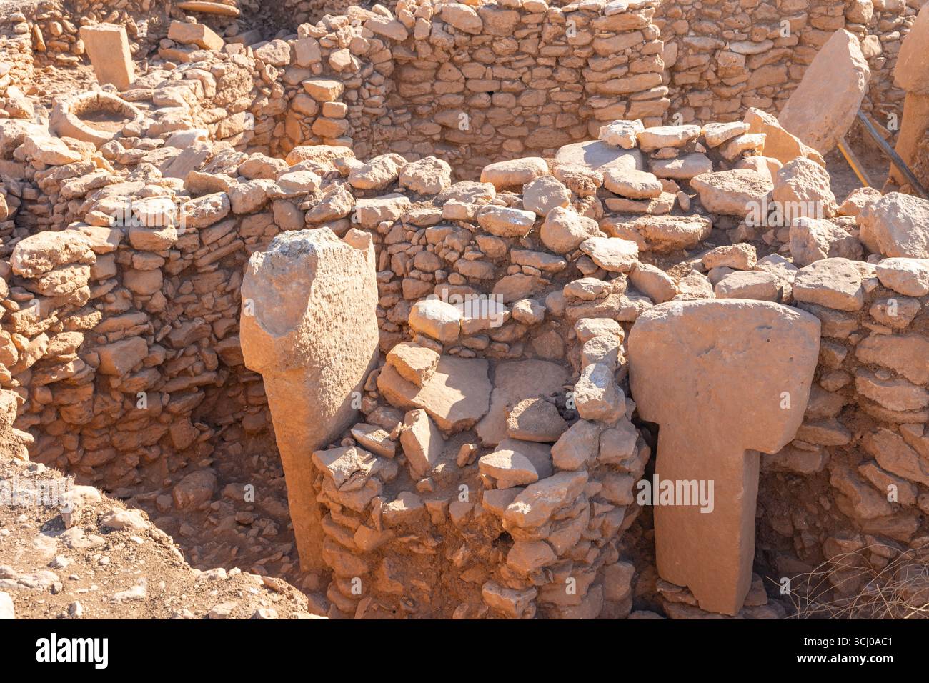 T-shaped steles of Karahantepe or Karahan Tepe in Sanliurfa Turkey. Stock Photo