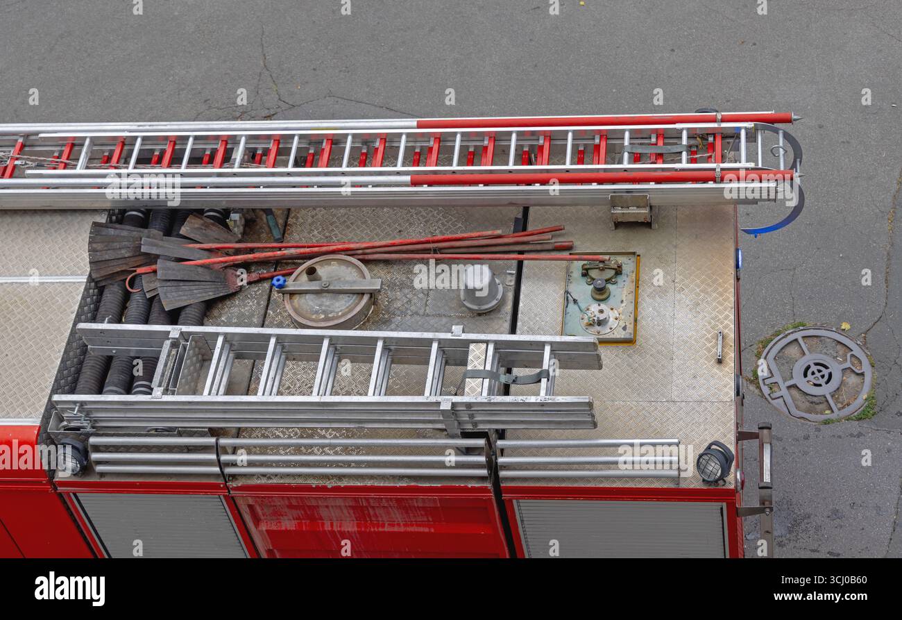 Long Ladder Hoses and Tools Storage at Roof Rack Fire Engine Truck Top ...
