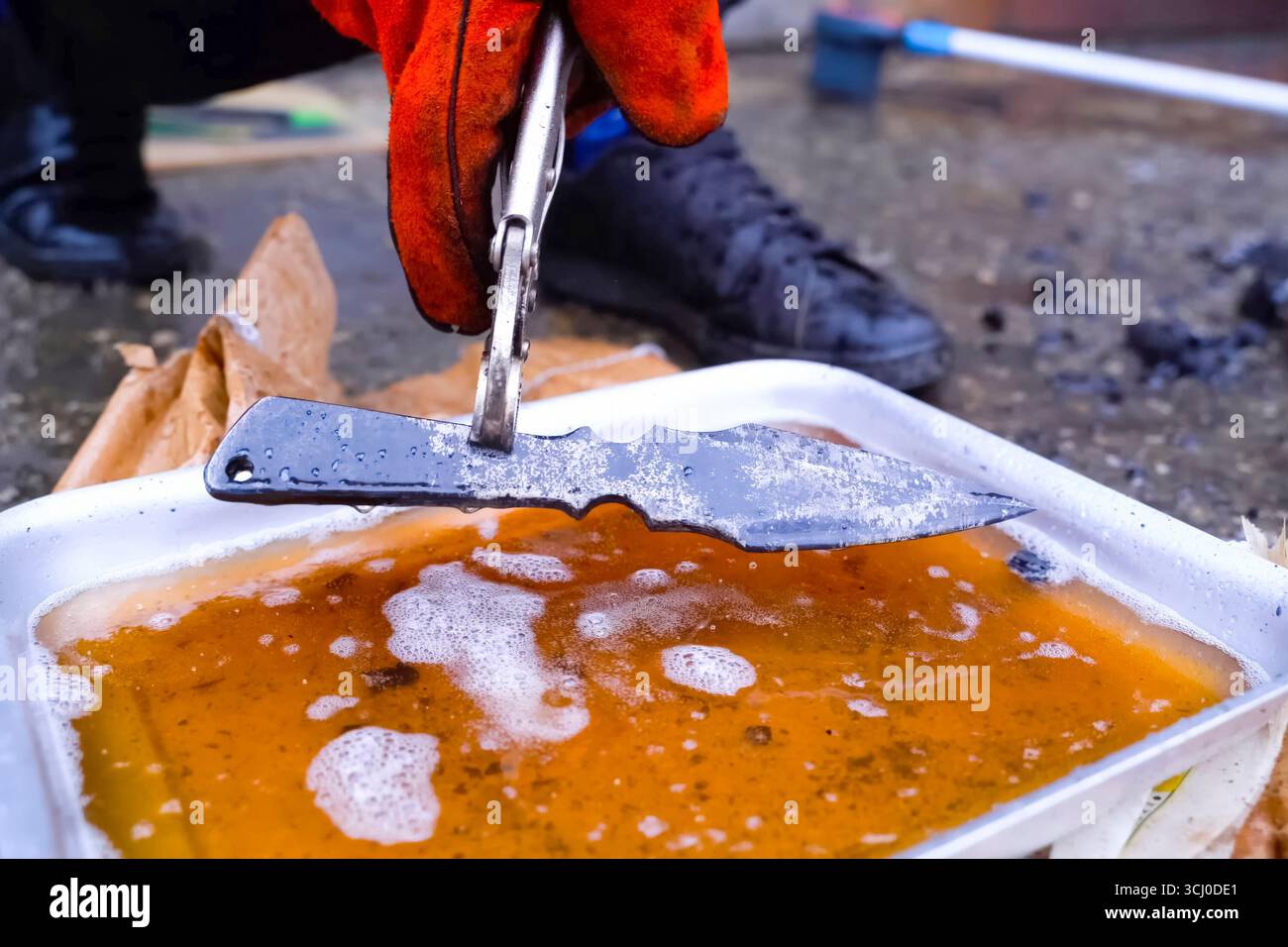 Washing in acid rust from the workpiece of the meta knife Stock Photo ...