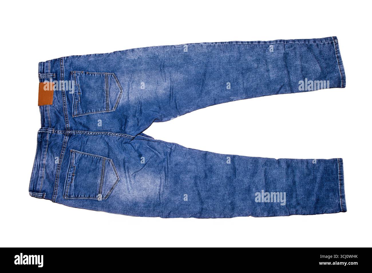 Blue jeans on a white background. Stock Photo