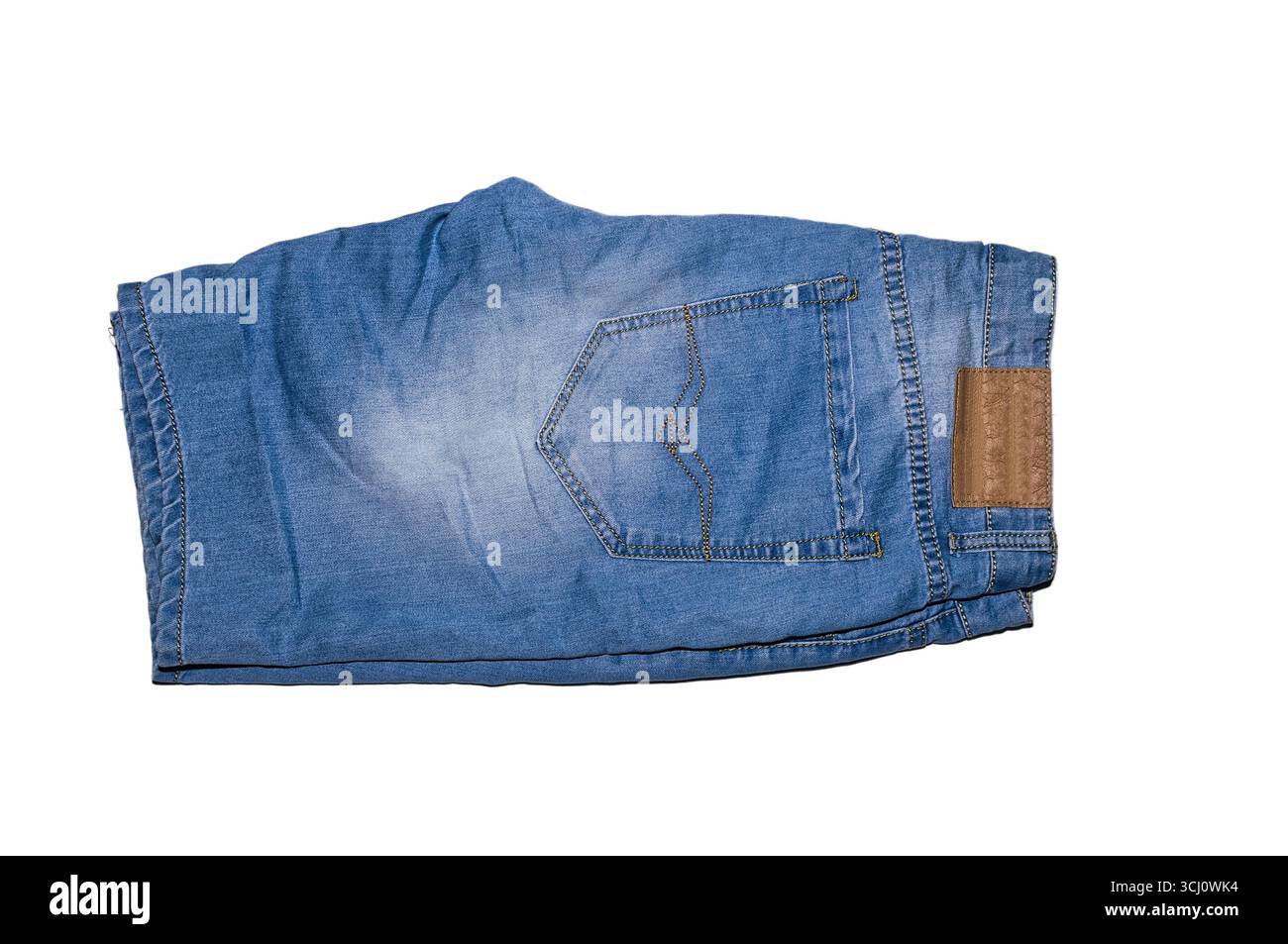 Blue denim shorts on a white background. Stock Photo