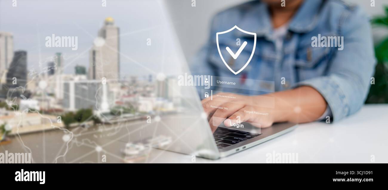 Cybersecurity concept with hologram secure login screen on laptop, showing username and password fields with shield checkmark icon. Data protection, o Stock Photo