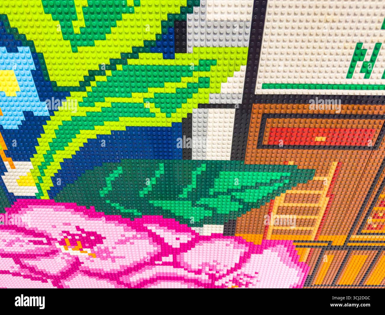 Colorful mosaic made from Lego toy building bricks depicting abstract ...
