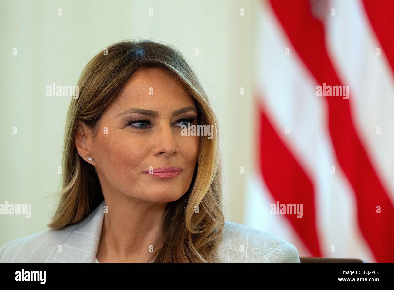 First lady Melania Trump listens during a meeting of the White House ...