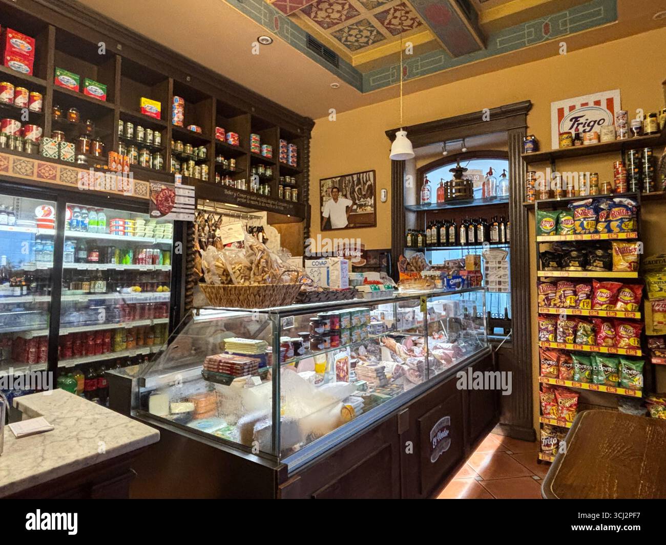 Cozy interior of traditional Spanish tapas bar in Cadiz, with wooden ...