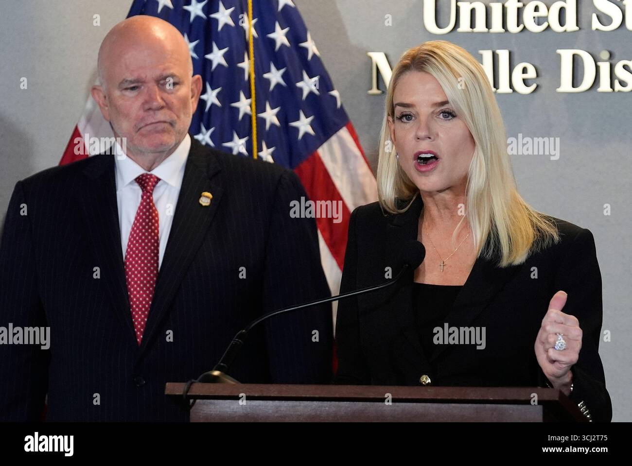 Attorney General Pam Bondi speaks as U.S. Attorney of Middle District ...