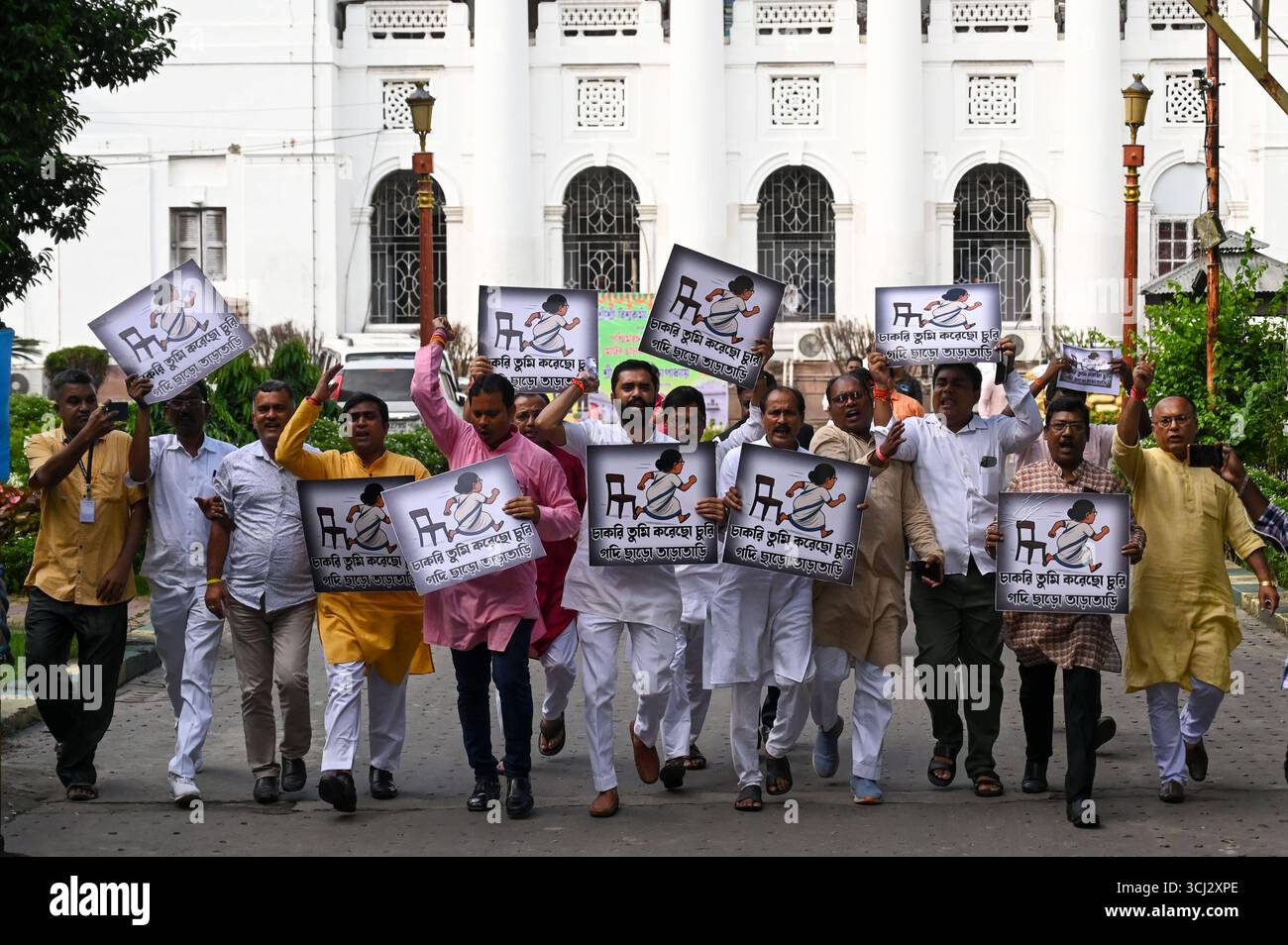 KOLKATA, INDIA - SEPTEMBER 4: Bharatiya Janata Party BJP MLAs protest against alleged assault on BJP MLA Shankar Ghosh inside State Legislative Assembly House on September 4, 2025 in Kolkata, India. Tensions erupted when Speaker Biman Banerjee called in marshals to evict BJP MLA and party s chief whip, Dr Sankar Ghosh, following his suspension. BJP legislators stormed the well, chanting Jai Shri Ram slogans and stalling proceedings, even as the Trinamool Congress-led government sought to pass a motion condemning attacks on Bengali migrant workers in BJP-ruled states. Photo by Samir Jana/Hindus Stock Photo