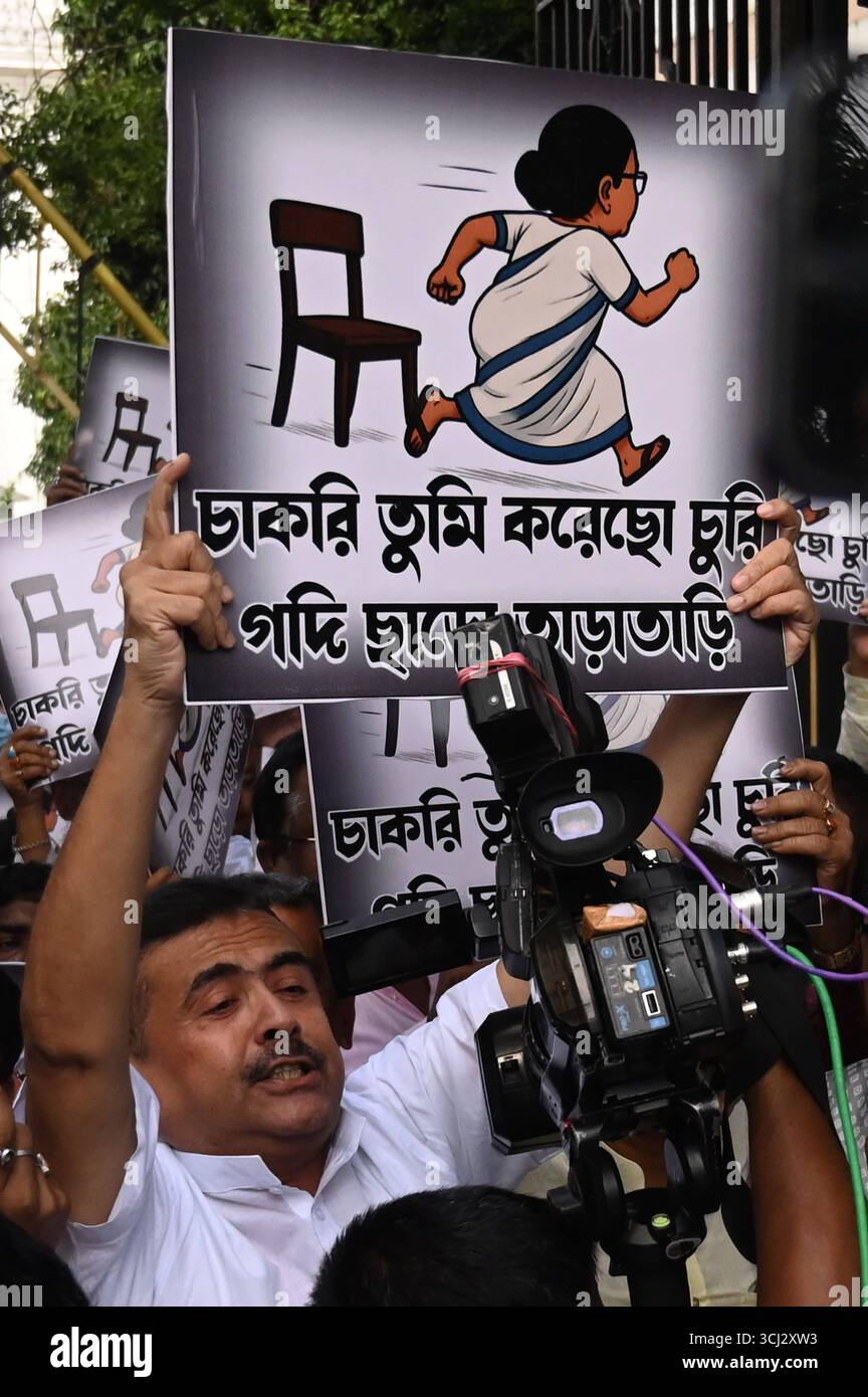 KOLKATA, INDIA - SEPTEMBER 4: LOP and Bharatiya Janata Party BJP MLA Suvendu Adhikari protest against alleged assault on BJP MLA Shankar Ghosh inside State Legislative Assembly House on September 4, 2025 in Kolkata, India. Tensions erupted when Speaker Biman Banerjee called in marshals to evict BJP MLA and party s chief whip, Dr Sankar Ghosh, following his suspension. BJP legislators stormed the well, chanting Jai Shri Ram slogans and stalling proceedings, even as the Trinamool Congress-led government sought to pass a motion condemning attacks on Bengali migrant workers in BJP-ruled states. Ph Stock Photo