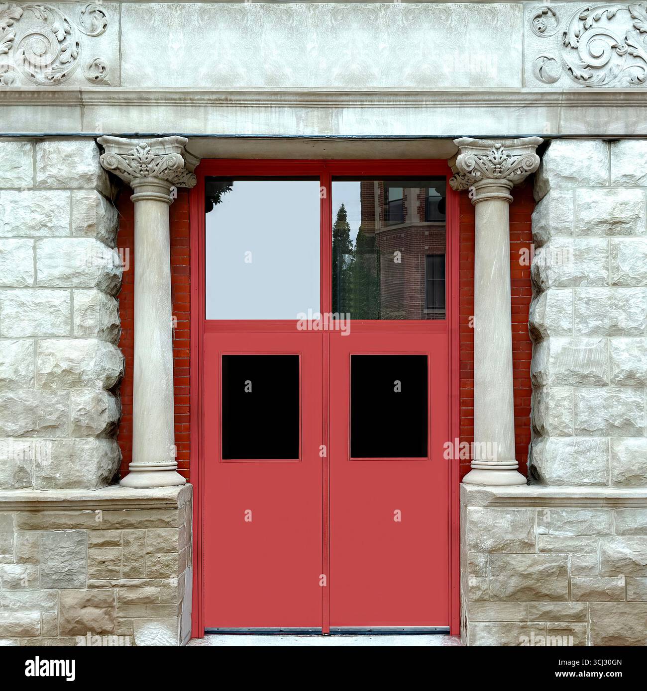 Historic Chicago stone building facade with ornate columns framing a red double door. - Smartphone Captured Stock Image