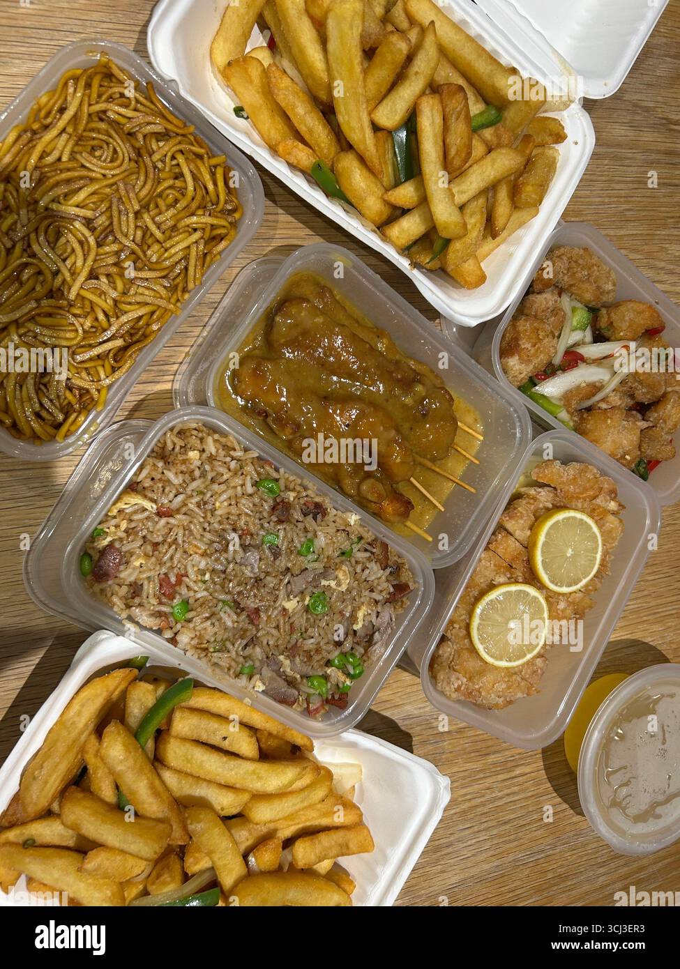 English style Chinese takeaway food in containers - Smartphone Captured Stock Image