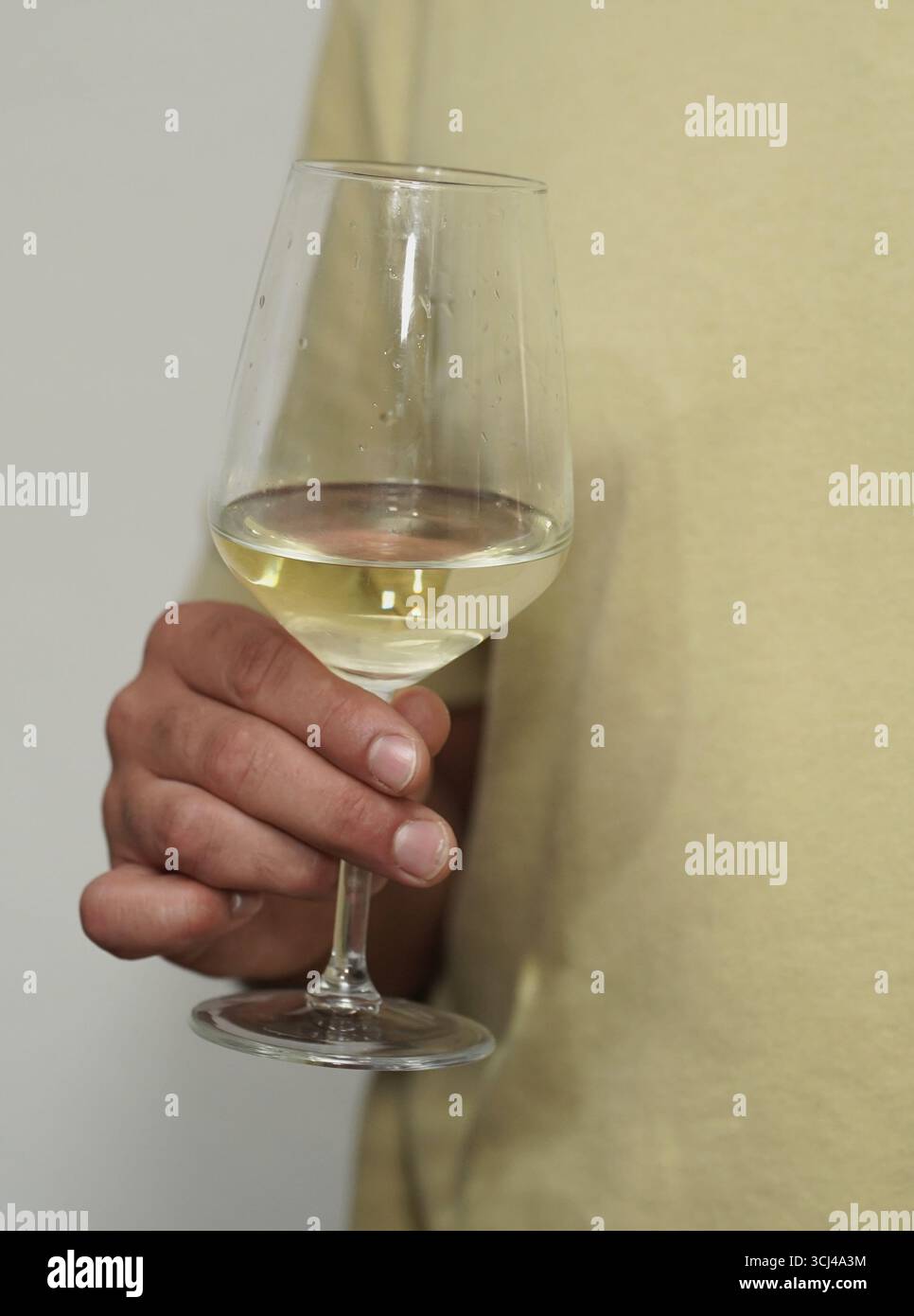 Person fingers holding champagne hi-res stock photography and images ...