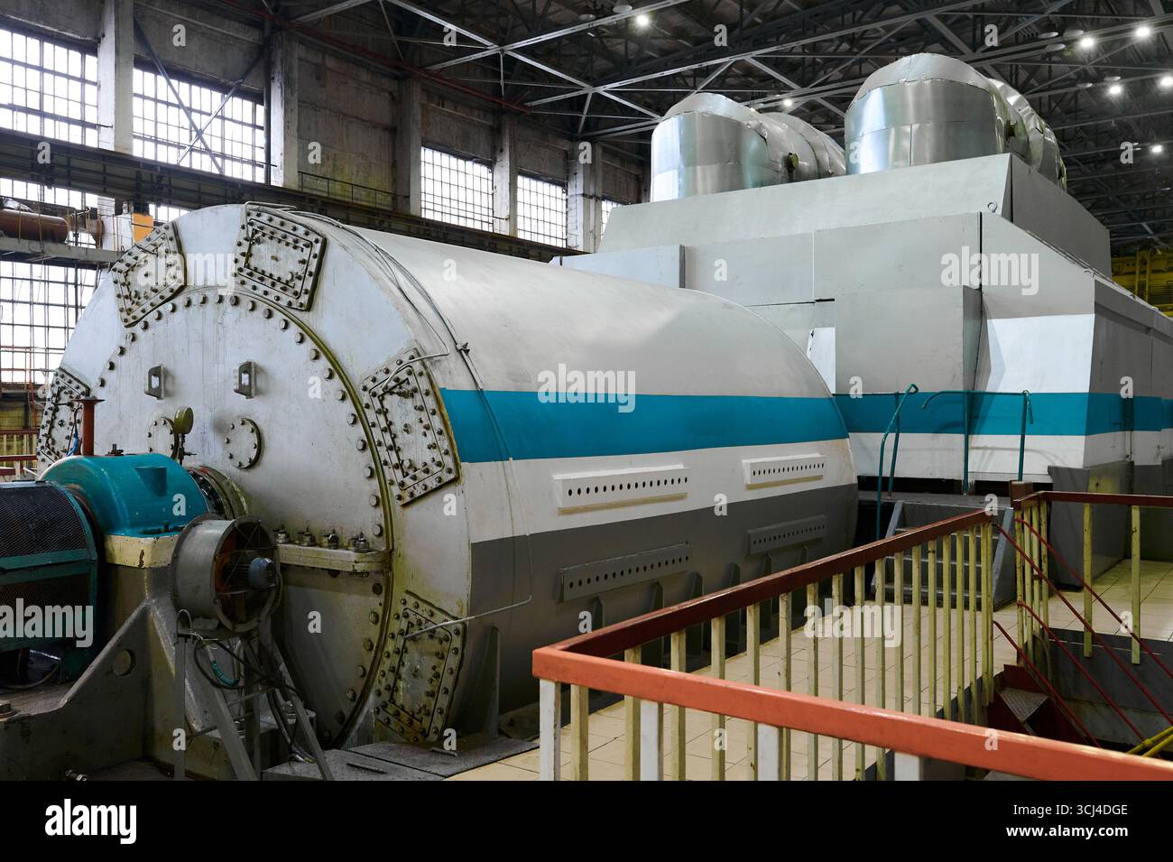Powerful industrial steam turbine generator set situated in a thermal power  plant machine hall during daylight hours Stock Photo - Alamy
