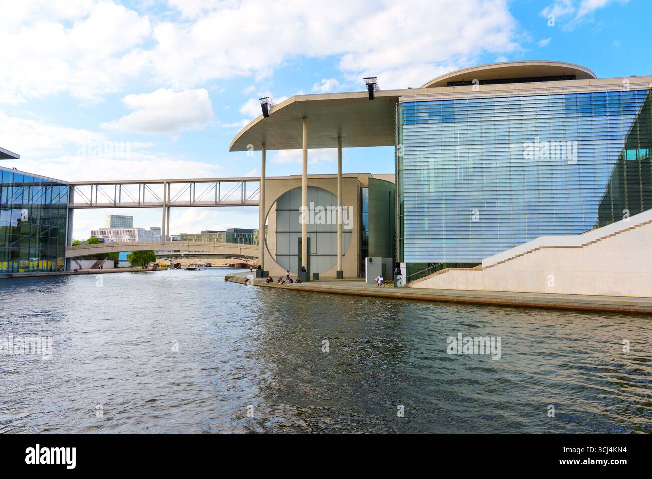 Berlin, Germany - August 20, 2025: Architectural view of the Marie-Elisabeth-Lueders-Haus on the banks of the River Spree in Berlin, featuring sleek, Stock Photo