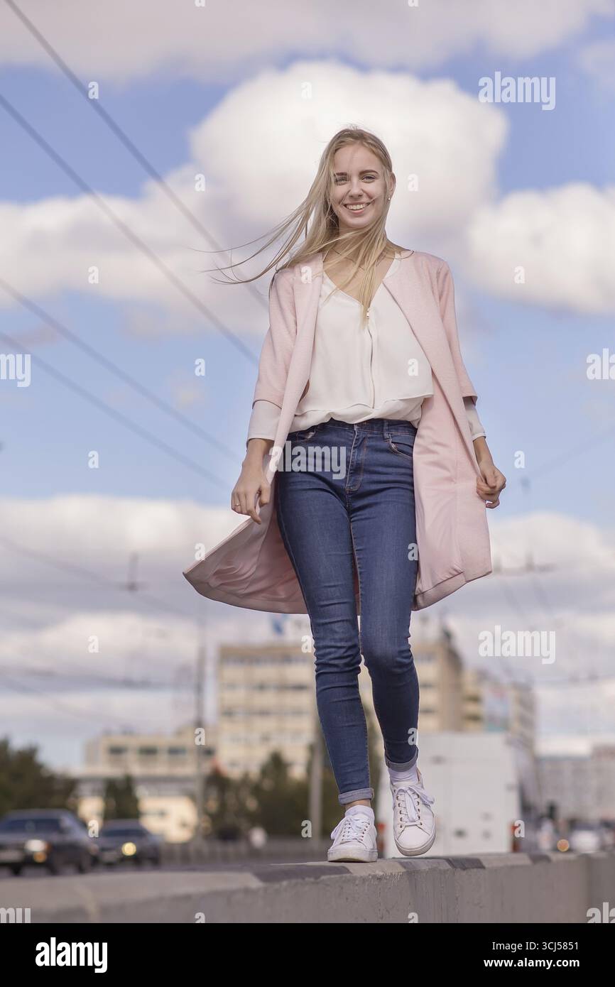 Portrait happy girl in city hi-res stock photography and images - Alamy