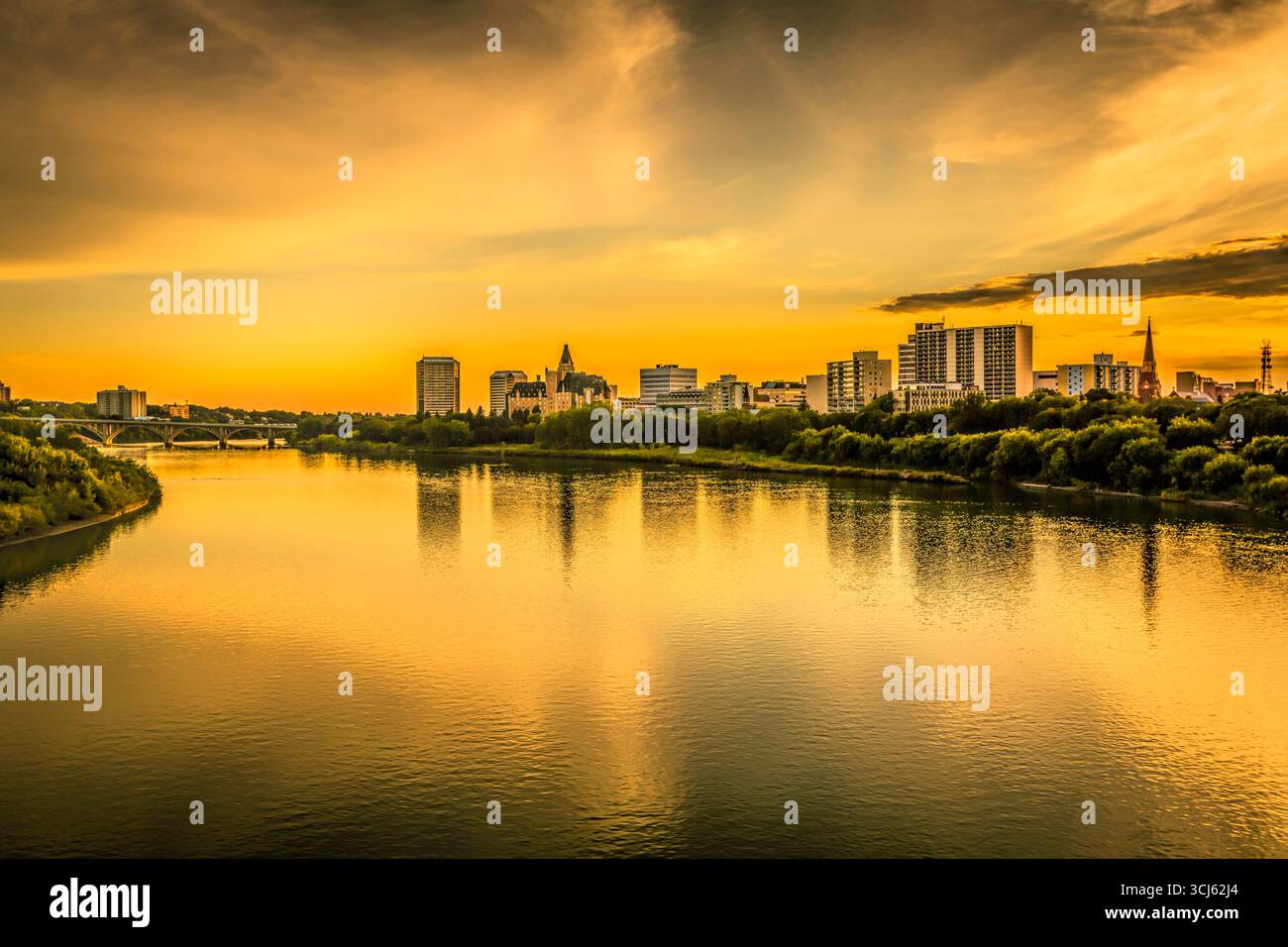 The skyline of Saskatoon, Canada at sunset. Stock Photo