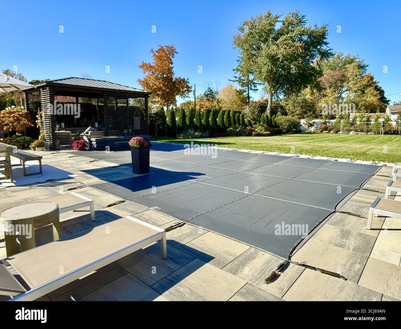 Winterized J shaped built-in, inground pool with safety Loop - Loc mesh ...