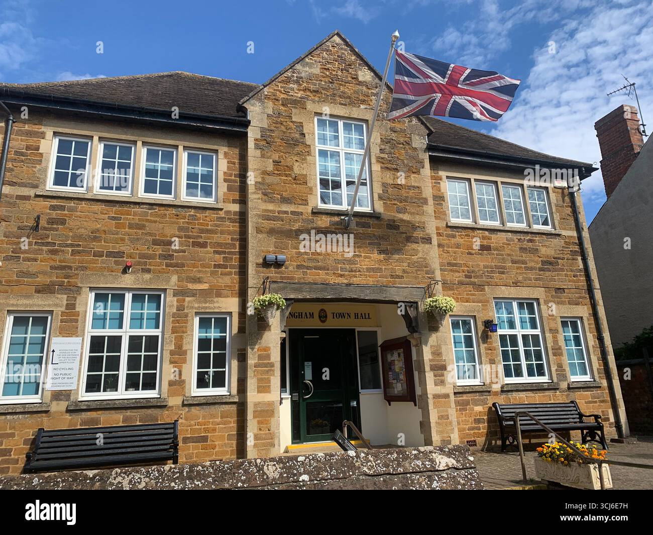 Town Hall Uppingham Councill building buildings flag UK British Rutland County Council history historic place High Street Oakham Market Town Village - Smartphone Captured Stock Image