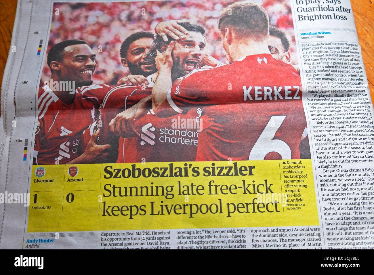 'Szoboszlai 's sizzler Stunning late free-kick keeps Liverpool perfect' Guardian newspaper headline Liverpool FC football article 1 September 2025 UK Stock Photo